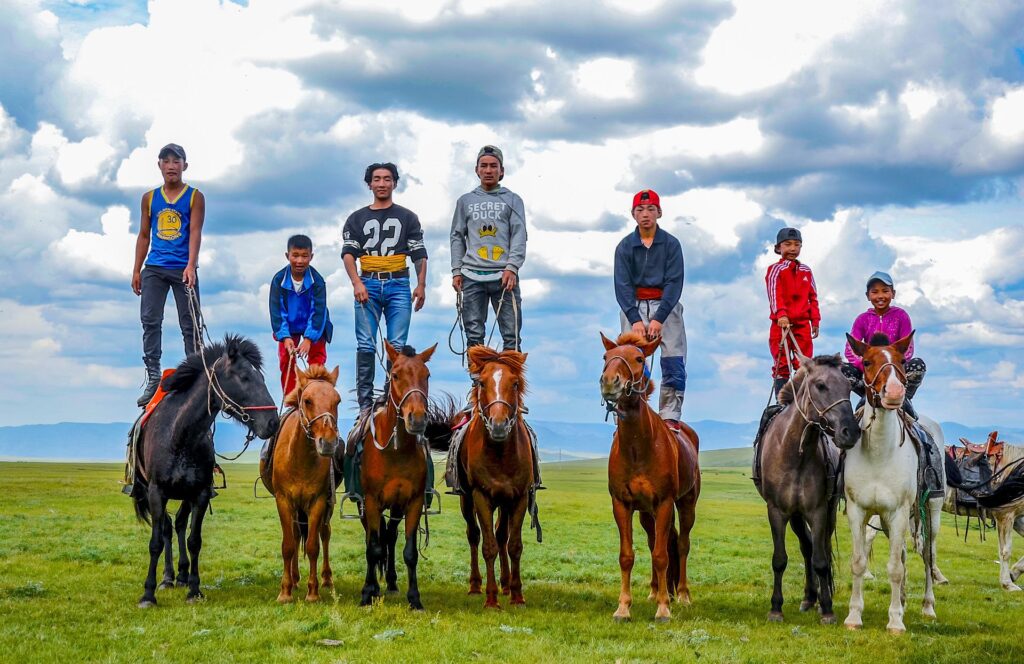 Mongolian children on horseback