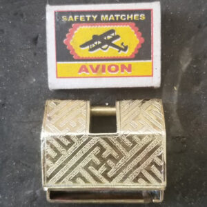 Mongolian traditional lock in yellow with a match